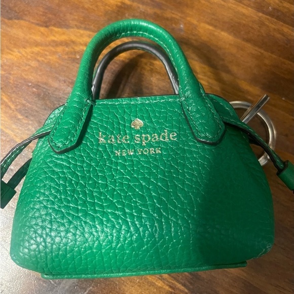 kate spade Handbags - Kate Spade Green Mini Bag with Dome Shape and Gold Accents